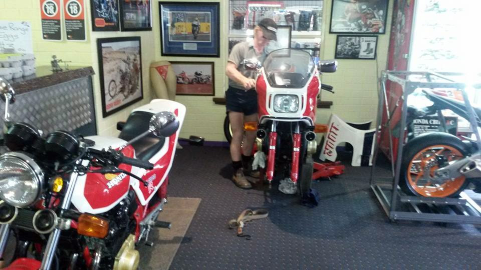 The bar sports several motorcycles, including a couple of Harleys