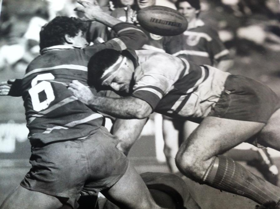 Malloy tackling Andrew McCalman